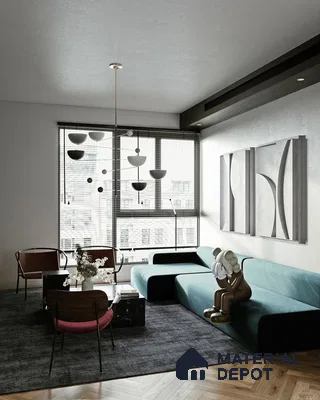 A cozy living room with plush sofas, a coffee table, and a bookshelf.